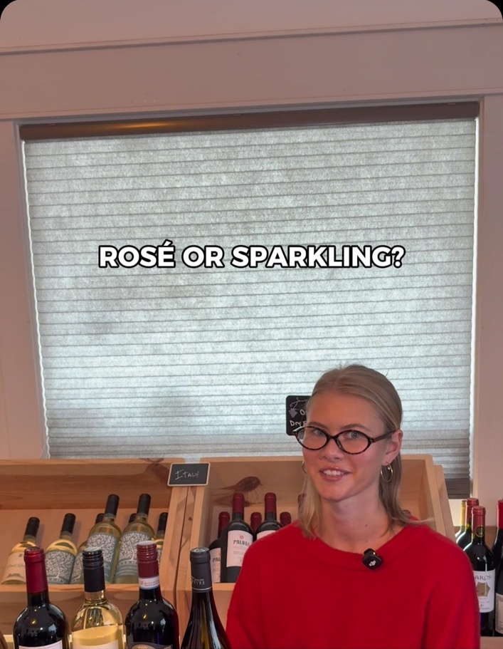Wine by the Bay staff member answering a wine question in a short-form video